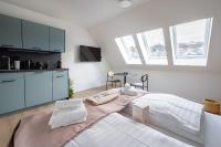 limehome Stuttgart Elsenhansstr客房内的一张或多张床位