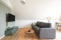 limehome Stuttgart Elsenhansstr的电视和/或娱乐中心