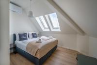 limehome Stuttgart Elsenhansstr客房内的一张或多张床位