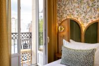 Hôtel Jardin de Cluny客房内的一张或多张床位