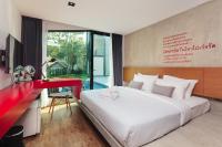 Stellars Samed Resort客房内的一张或多张床位
