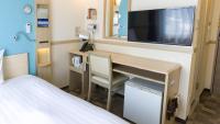 Toyoko Inn Hiroshima-eki Shinkansen-guchi No.2的电视和/或娱乐中心