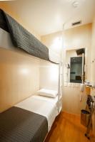 FAST SLEEP Guarulhos by Slaviero Hotéis客房内的一张或多张床位