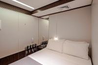 FAST SLEEP Guarulhos by Slaviero Hotéis客房内的一张或多张床位