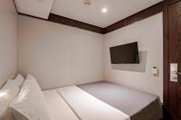 FAST SLEEP Guarulhos by Slaviero Hotéis客房内的一张或多张床位