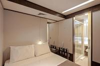 FAST SLEEP Guarulhos by Slaviero Hotéis客房内的一张或多张床位
