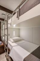 FAST SLEEP Guarulhos by Slaviero Hotéis客房内的一张或多张床位