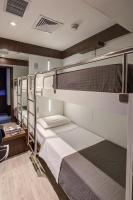 FAST SLEEP Guarulhos by Slaviero Hotéis客房内的一张或多张床位