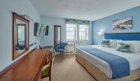 Best Western Moores Central Hotel客房内的一张或多张床位