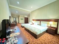 Modern Hotel客房内的一张或多张床位