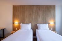 Sooz Hotel Collection客房内的一张或多张床位