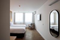 Sooz Hotel Collection客房内的一张或多张床位
