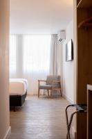 Sooz Hotel Collection客房内的一张或多张床位