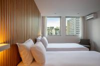 Sooz Hotel Collection客房内的一张或多张床位