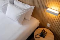 Sooz Hotel Collection客房内的一张或多张床位