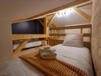 Chalet neuf 14 pers proximit&eacute; La Clusaz et Grand Bornand&#x5BA2;&#x623F;&#x5185;&#x7684;&#x4E00;&#x5F20;&#x6216;&#x591A;&#x5F20;&#x53CC;&#x5C42;&#x5E8A;