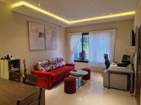 Ferienhaus in Paraguay, Encarnacion, 200 Meter vom Parana.的电视和/或娱乐中心
