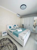 Apartament lux客房内的一张或多张床位