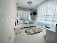 Apartament lux的电视和/或娱乐中心