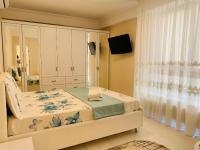 Apartament lux客房内的一张或多张床位