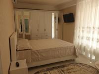 Apartament lux客房内的一张或多张床位