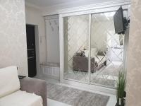 Apartament lux客房内的一张或多张床位