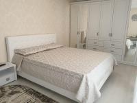Apartament lux客房内的一张或多张床位