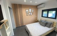 BARCARESA-Villa Flamants Roses客房内的一张或多张床位