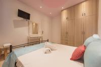 Santorita Suites客房内的一张或多张床位