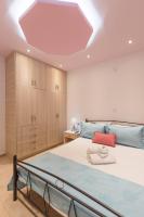 Santorita Suites客房内的一张或多张床位