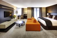 Rendezvous Heritage Hotel Queenstown客房内的一张或多张床位