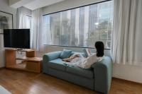 Suites Coben Apartamentos Amueblados的电视和/或娱乐中心