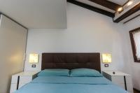 Cà del paradiso客房内的一张或多张床位