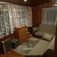 Domek03 Osrodek Wypoczynkowy Joanna Wojowo的休息区