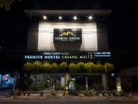清迈Premier Hostel Chiang Mai的带有读取一流酒店商场标志的建筑