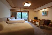 鬼怒川日光酒店(Hotel Sunshine Kinugawa)客房内的一张或多张床位