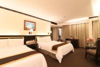 Bayview Park Hotel Manila客房内的一张或多张床位