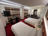 Bayview Park Hotel Manila客房内的一张或多张床位