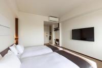 Tokyu Stay Fukuoka Tenjin客房内的一张或多张床位