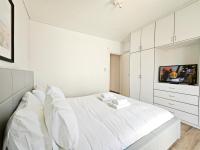 Kalipsous by Verde Apartments客房内的一张或多张床位