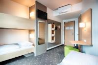 B&B Hotel Stuttgart-Neckarhafen客房内的一张或多张床位