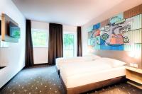 B&B Hotel Stuttgart-Neckarhafen客房内的一张或多张床位
