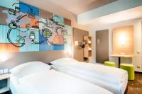 B&B Hotel Stuttgart-Neckarhafen客房内的一张或多张床位