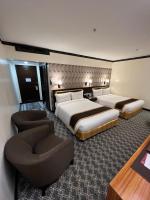 Bayview Park Hotel Manila客房内的一张或多张床位