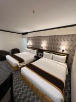Bayview Park Hotel Manila客房内的一张或多张床位