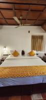 Kumarakom Tharavadu - A Heritage Hotel, Kumarakom客房内的一张或多张床位