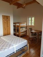 Chalet-Südsteiermark - traumhafte Aussicht, Infinity Pool, Privatsphäre, Klima und de-luxe Ausstattung客房内的一张或多张床位