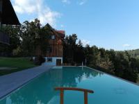 Chalet-Südsteiermark - traumhafte Aussicht, Infinity Pool, Privatsphäre, Klima und de-luxe Ausstattung内部或周边的泳池