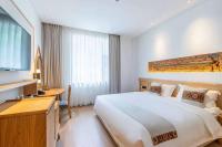 Yoba Boutique Hotel客房内的一张或多张床位