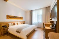 Yoba Boutique Hotel客房内的一张或多张床位